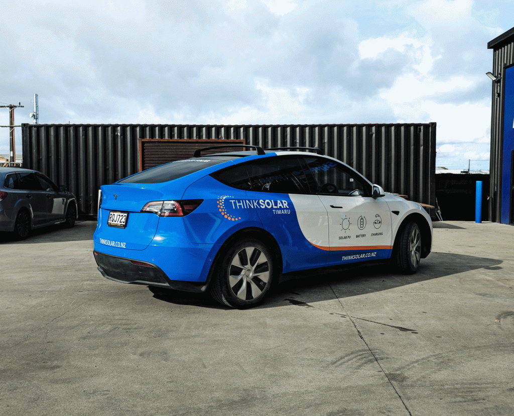 Close-up of premium vehicle wrap finish and graphics for Think Solar Timaru