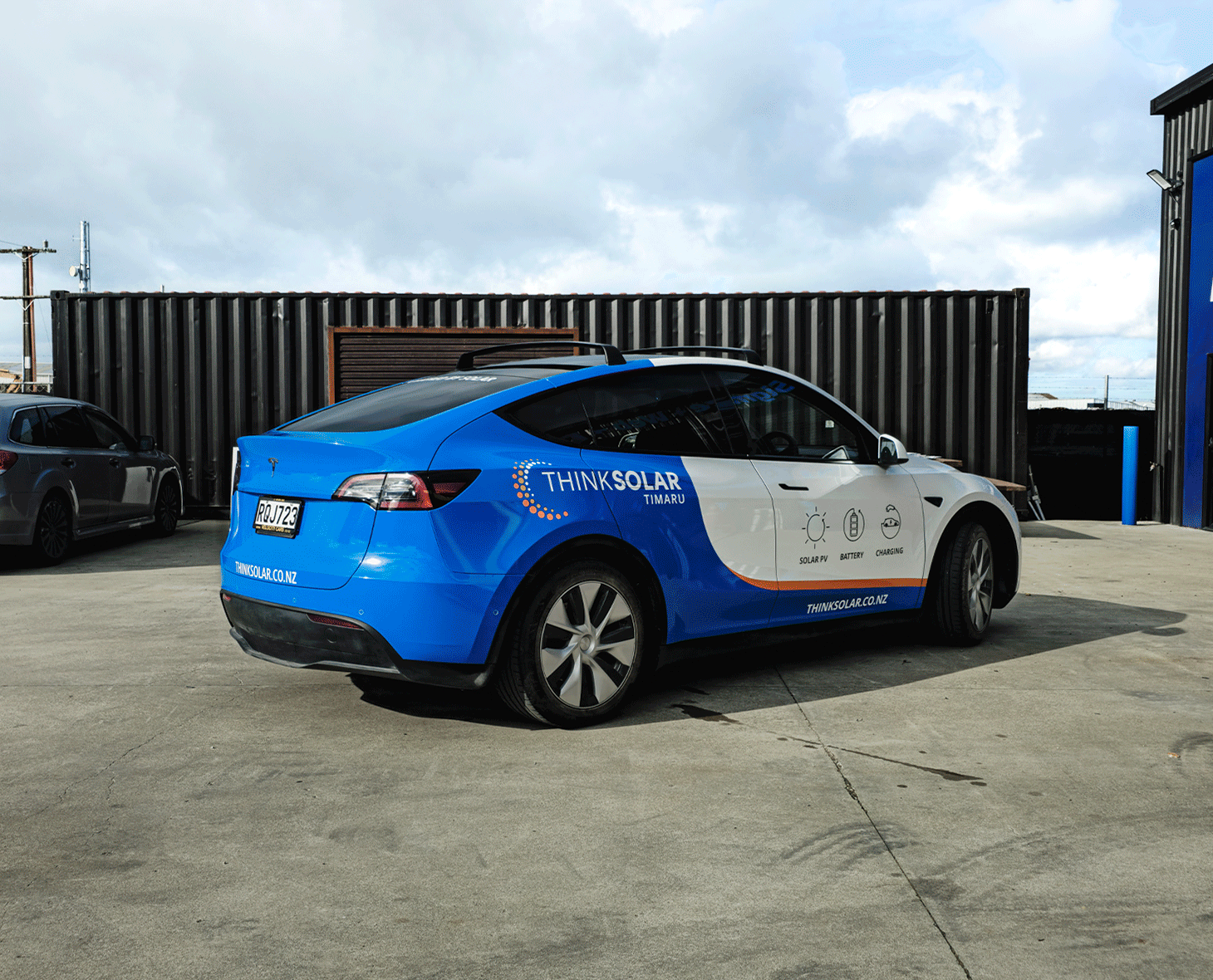 Close-up of premium vehicle wrap finish and graphics for Think Solar Timaru